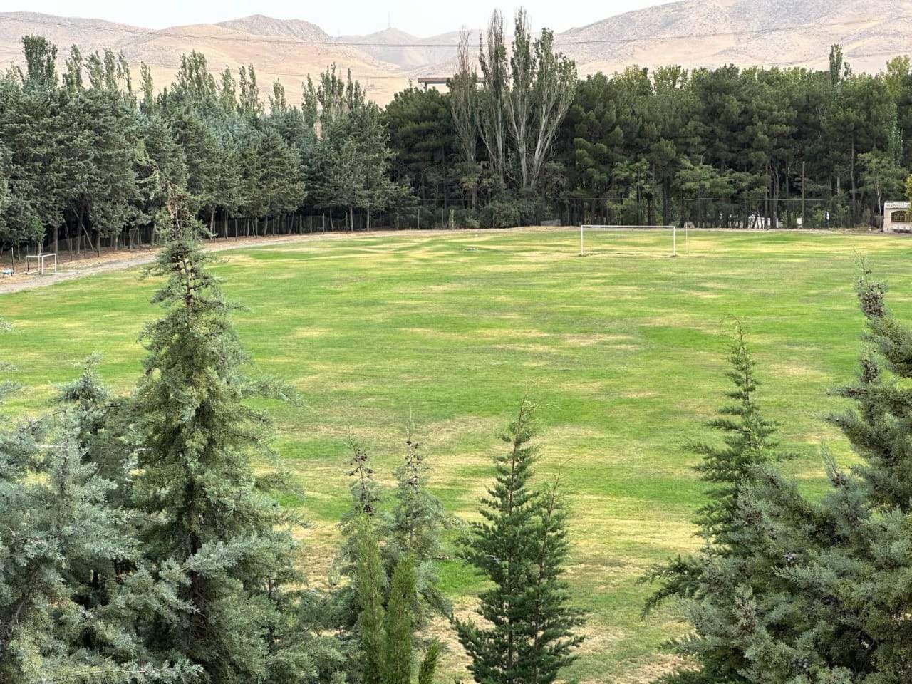 تصویر زمین چمن طبیعی شهید عباسپور بزرگ (هگزاگون)تهران